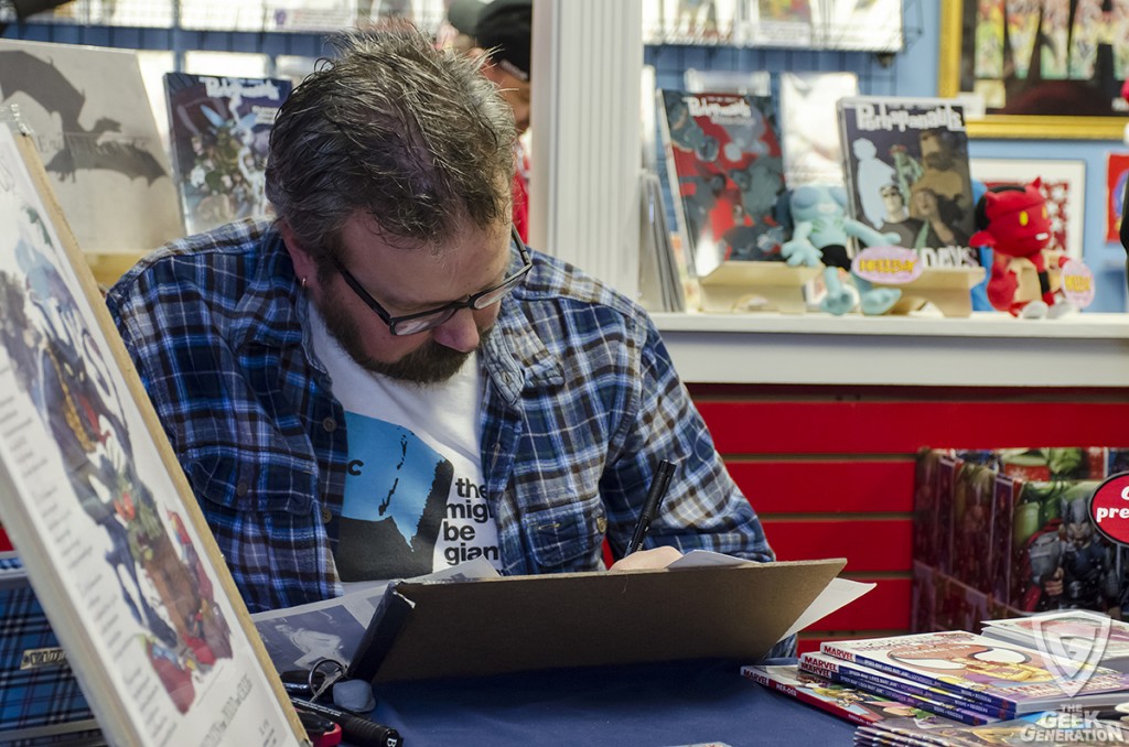 Craig Rousseau sketching at The Hall of Comics